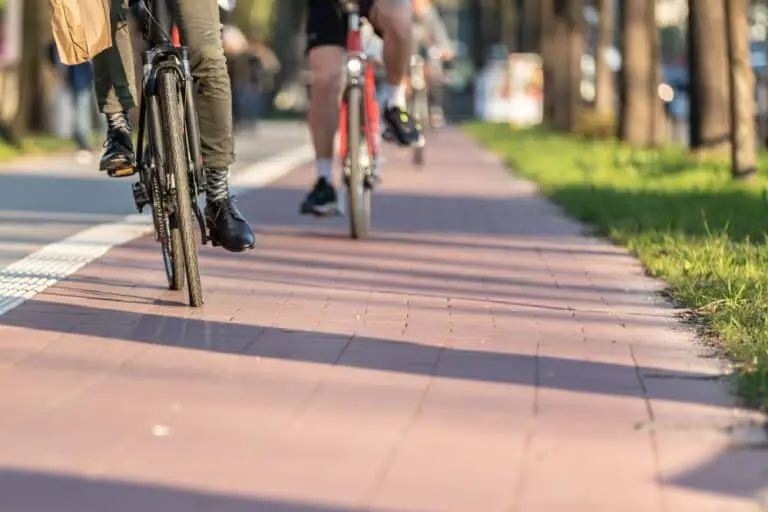 two cyclists on a bike path